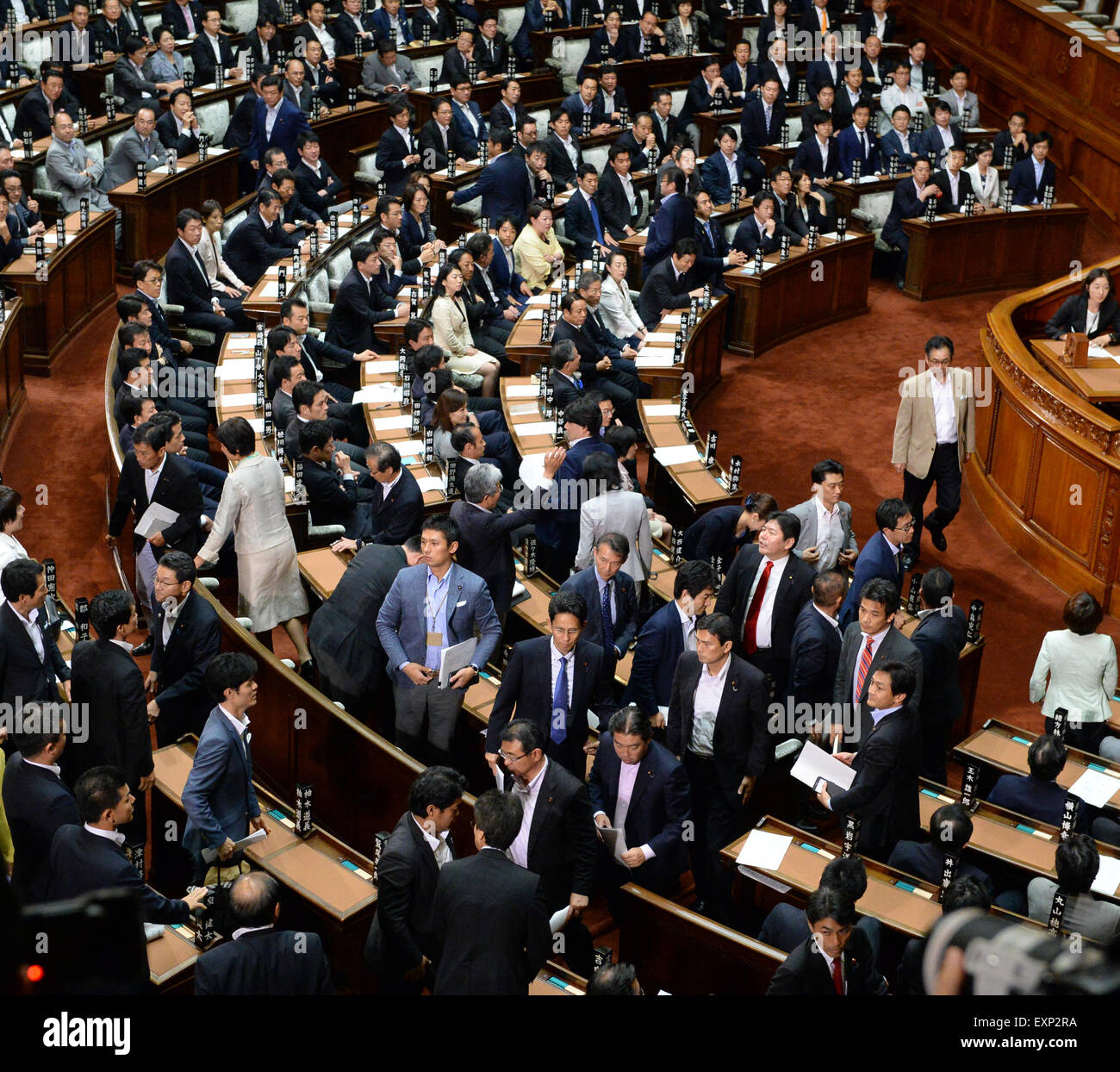 Tokyo, Japan. 16th July, 2015. Japanese opposition lawmakers leave the lower house to oppose the security bills in Tokyo, Japan, on July 16, 2015. Japan's ruling coalition led by Prime Minister Shinzo Abe on Thursday rammed through a series of controversial security bills in the all-powerful lower house of the nation's Diet amid strong public opposition, marking the most significant overturn of the nation's 'purely defensive' defense posture. Credit:  Ma Ping/Xinhua/Alamy Live News Stock Photo