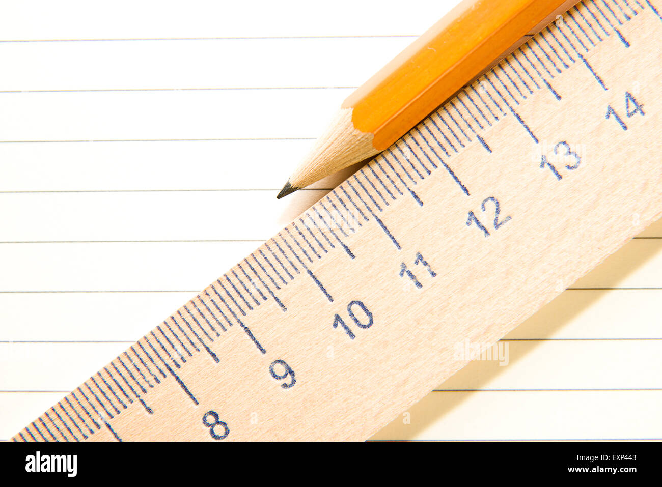 Notepad with a recording sheet, pencil and wooden ruler on the old ...