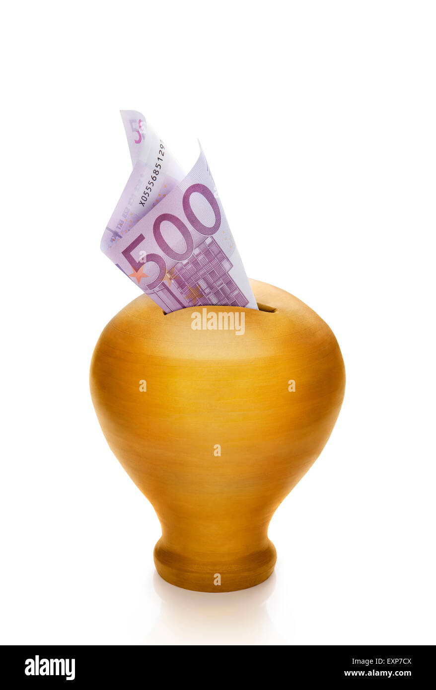 500 euros into a golden money box. Stock Photo