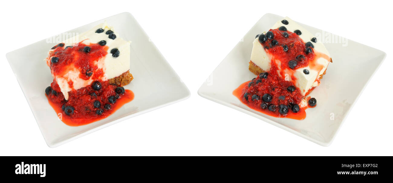 Yogurt and  honey pie cake with grated fresh strawberry and bilberry. White ceramic plates. Isolated Stock Photo
