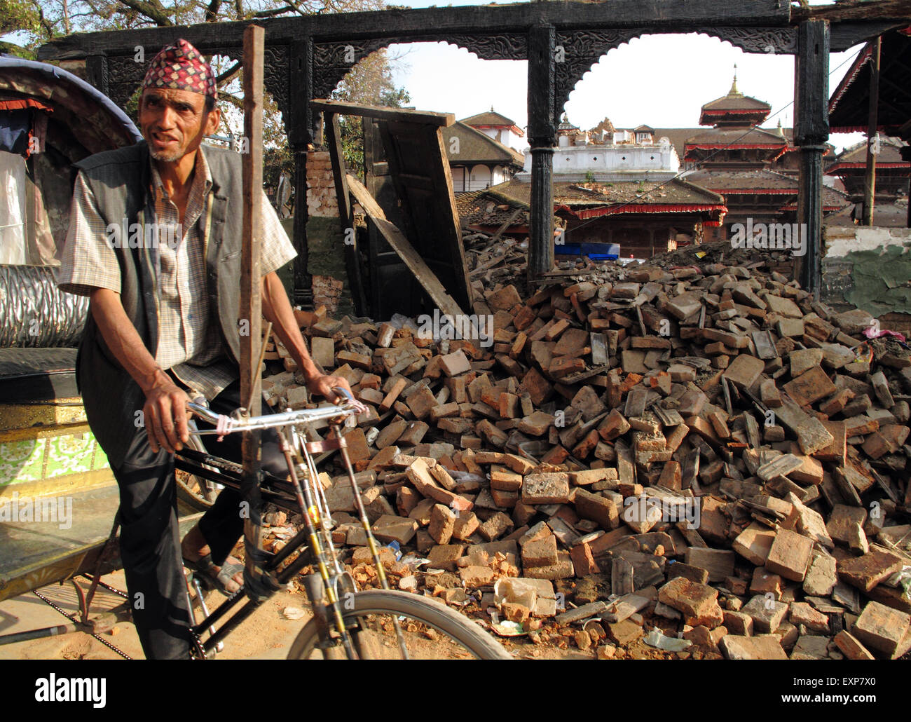 The Rickshaw Rider A rickshaw rider in the destruction in Durbar Square, Kathmandu a few ...