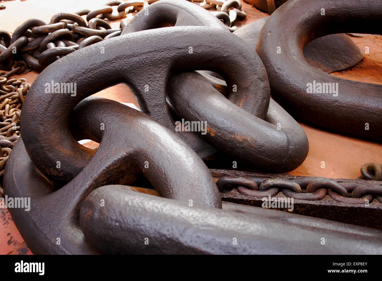 Black country industrial chain making huge large iron steel chain links Stock Photo