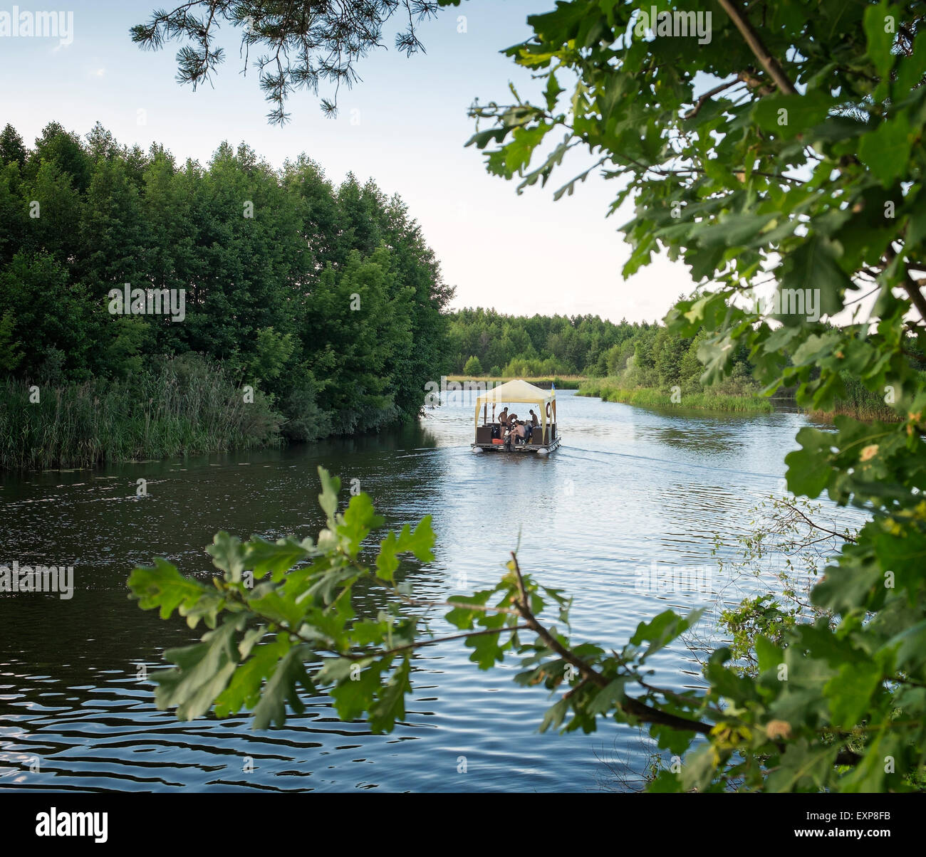 Raft floating on summer river Stock Photo - Alamy