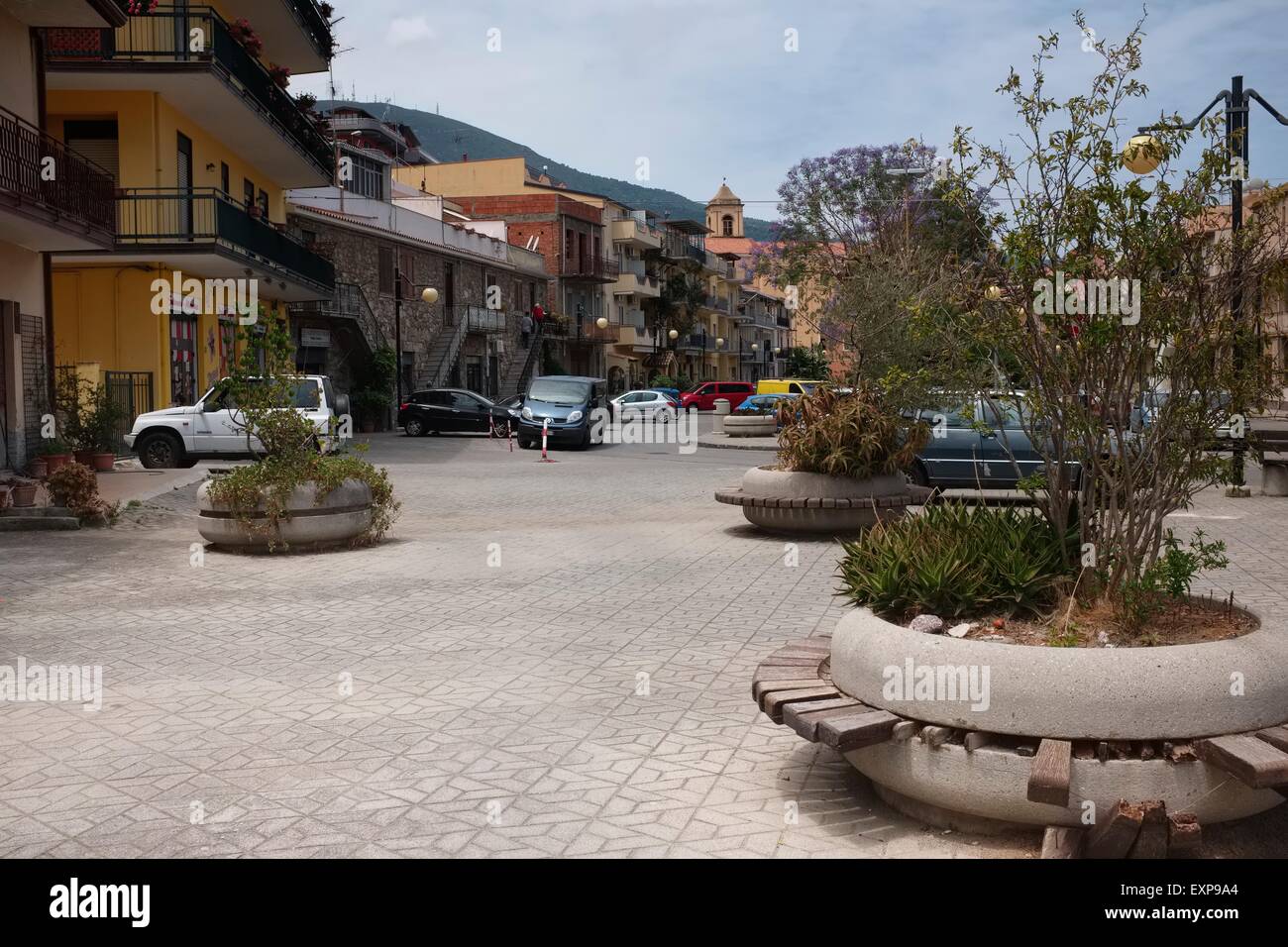 A quiet residential square with shops in Patti Marina, North Eastern Sicily Stock Photo Alamy