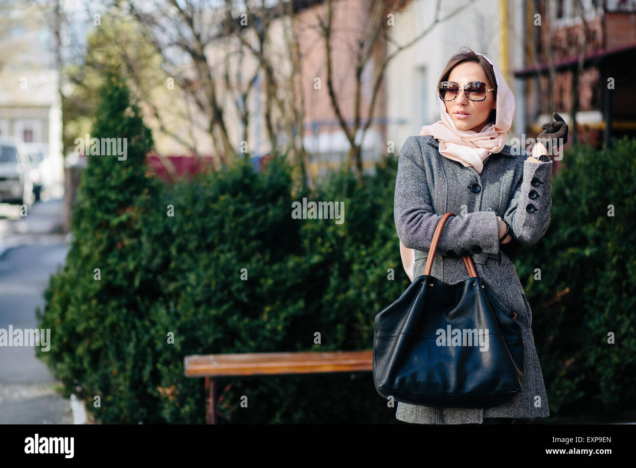 Happy young beautiful girl posing in the park Stock Photo - Alamy