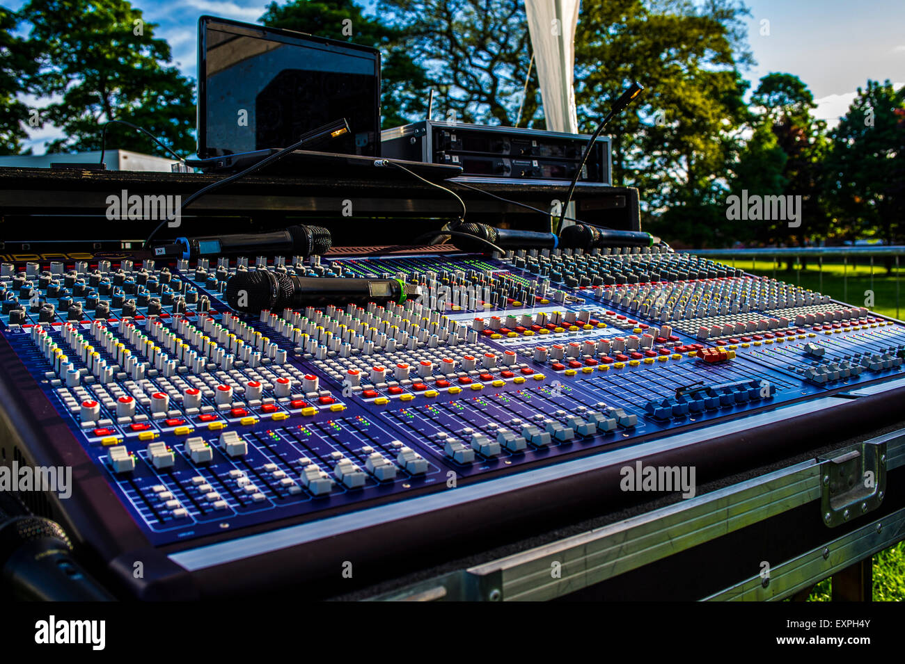 Mixing Desk Outdoor Concert With Radio Microphones And Laptop