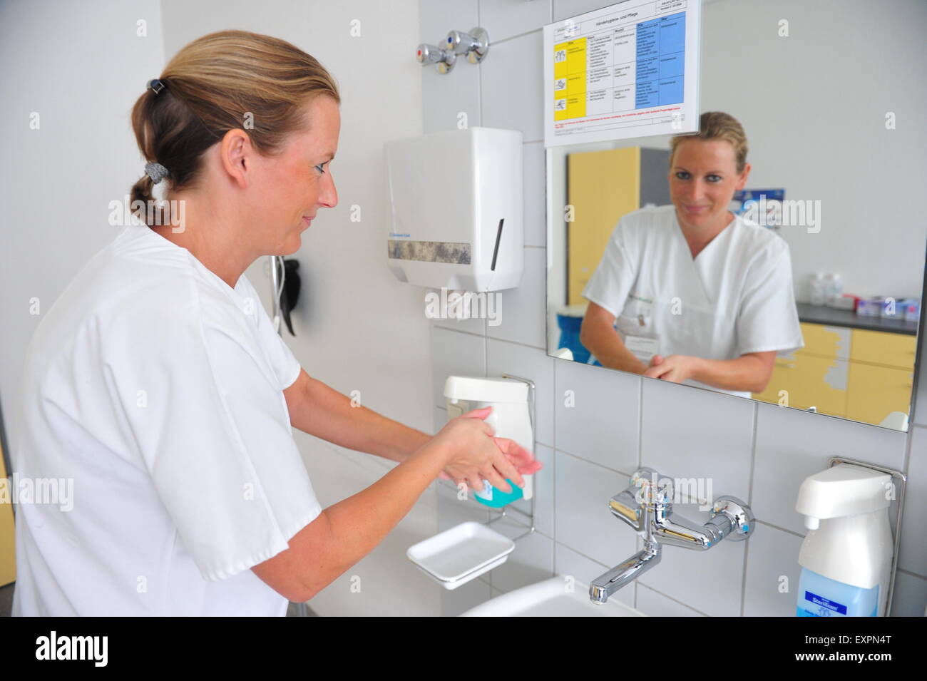 Frankfurt, Germany - September 17, 2009 - Doctor washing hands in hospital to avoid infections Stock Photo