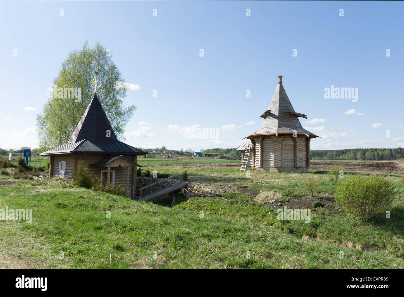 the chapel under which holy water proceeds costs under the blue sky Stock Photo