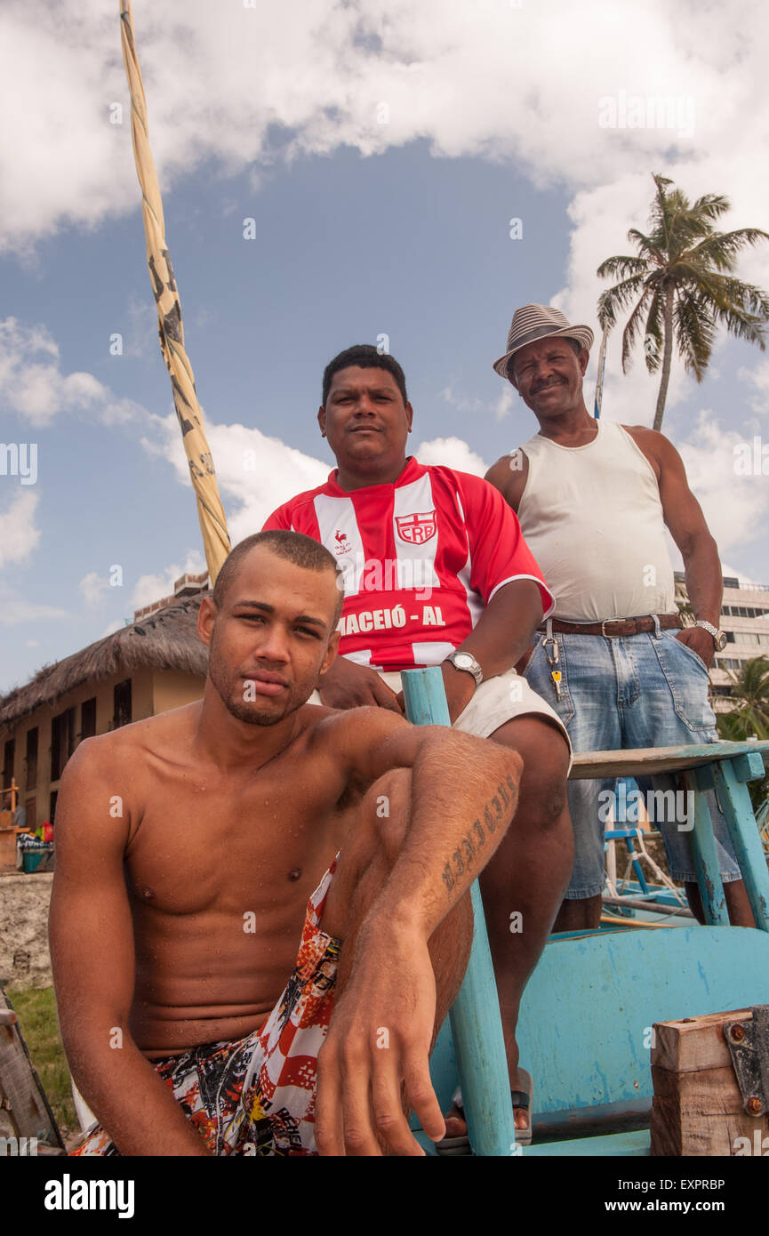 Maceio, Alagoas, State, Brazil. Ponta Verde beach. Three local fishermen. Stock Photo