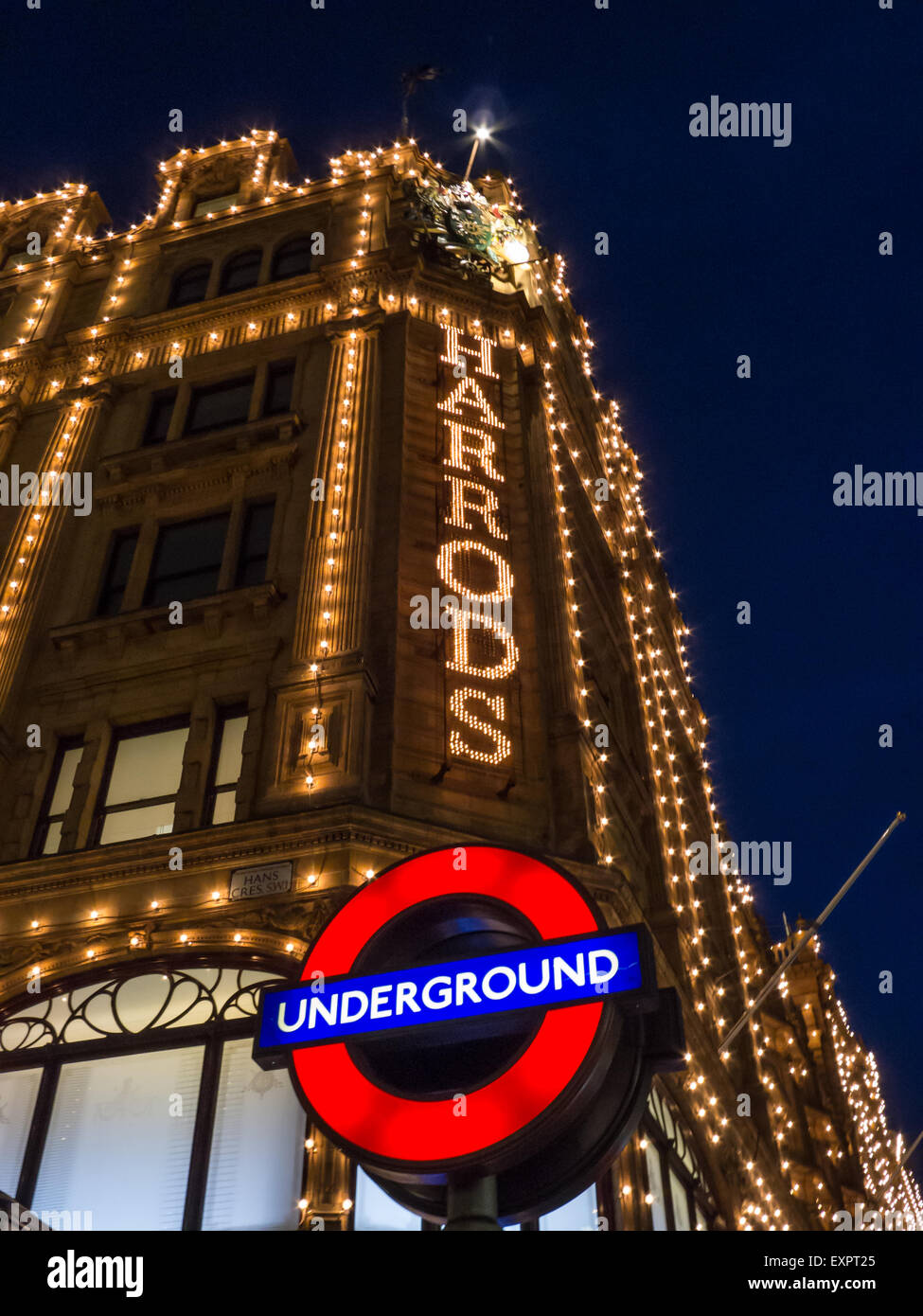 Knightsbridge, London, England. Harrods lights and Underground sign. Stock Photo