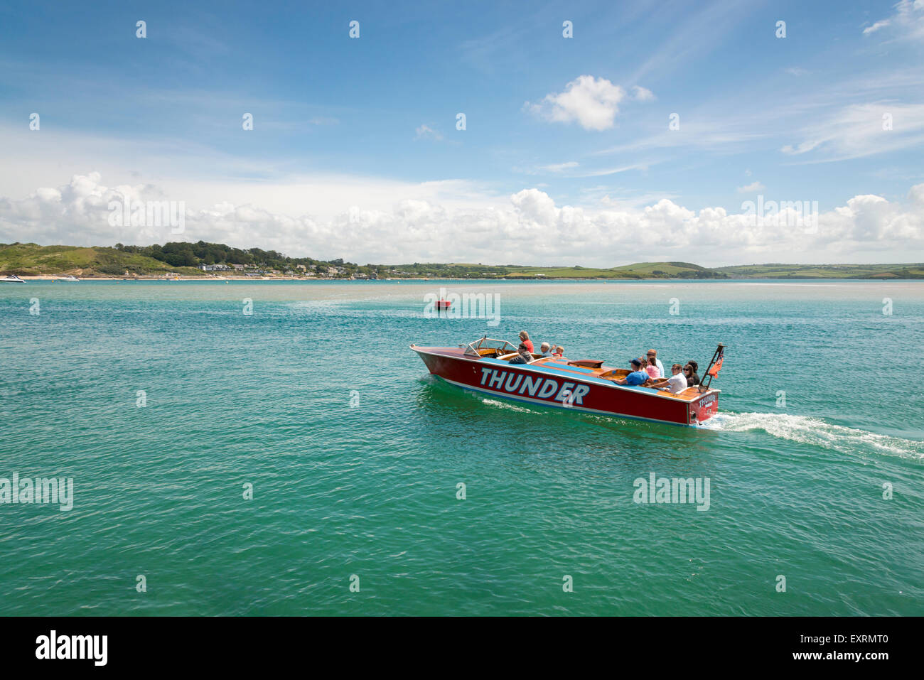 The Thunder speedboat carrying tourists on a high speed trip round the bay on the River Camel Estuary Padstow Cornwall UK Stock Photo