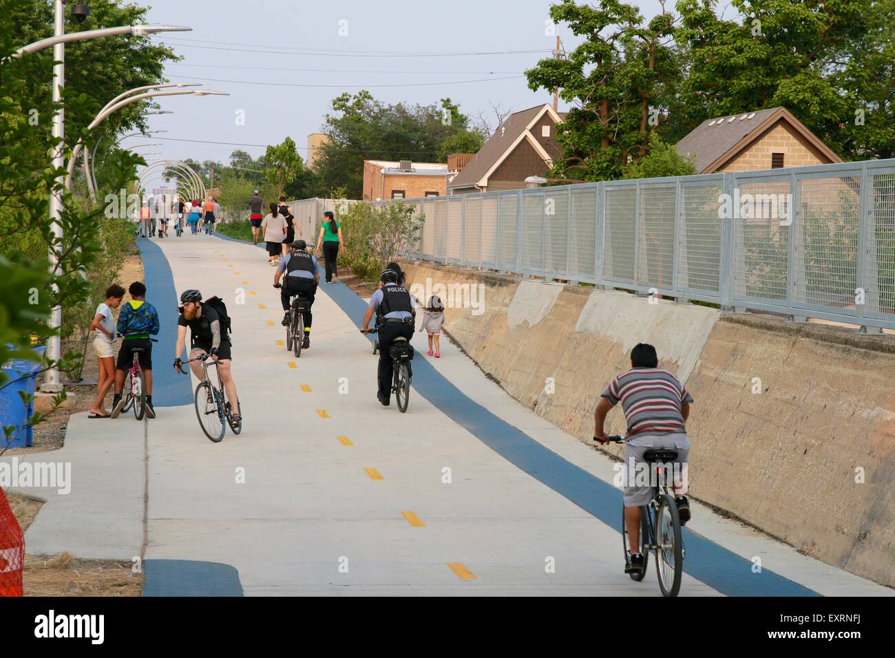 606/Bloomingdale Trail, Chicago, Illinois. Bicyclists and Chicago Police Department bike police. Stock Photo