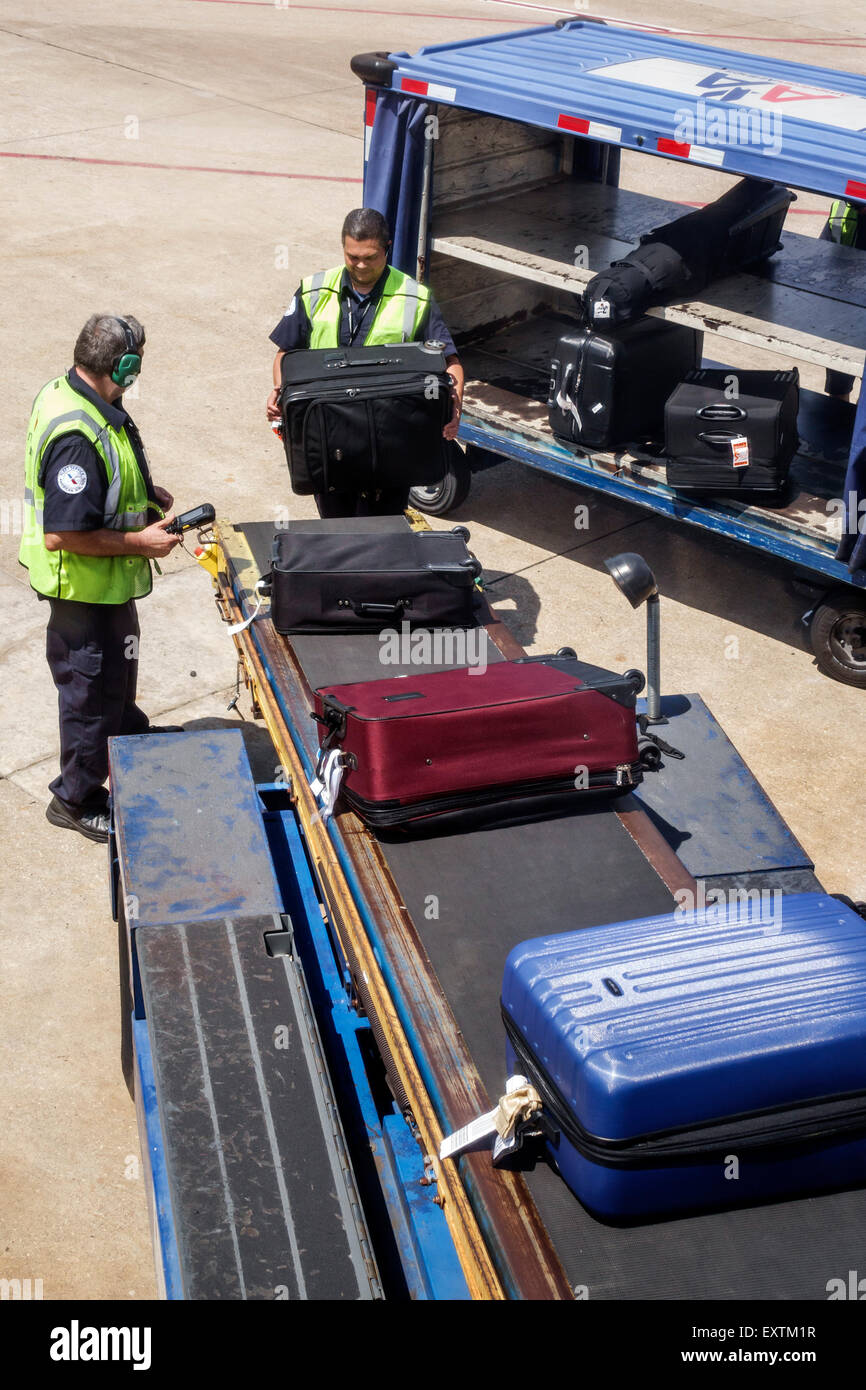 Dallas Texas,Dallas Ft. Fort Worth International Airport,DFW,American Airlines,terminal,jet,aircraft,American Airlines,ramp,apron,loading,luggage,bagg Stock Photo