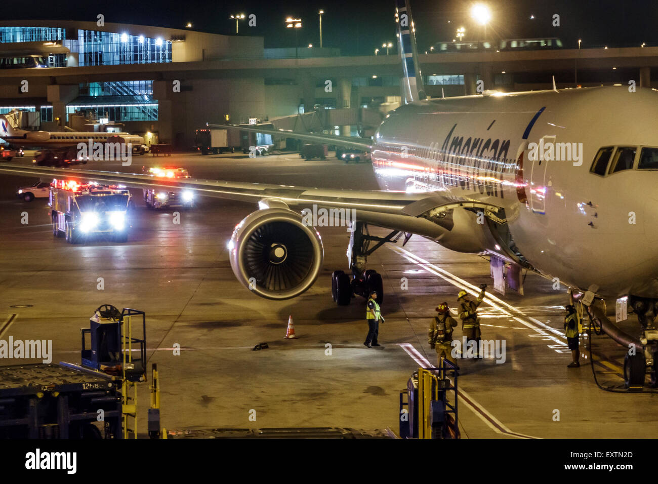 Dallas Texas,Dallas Ft. Fort Worth International Airport,DFW,American Airlines,terminal,jet,aircraft,American Airlines,ramp,apron,emergency vehicles,f Stock Photo