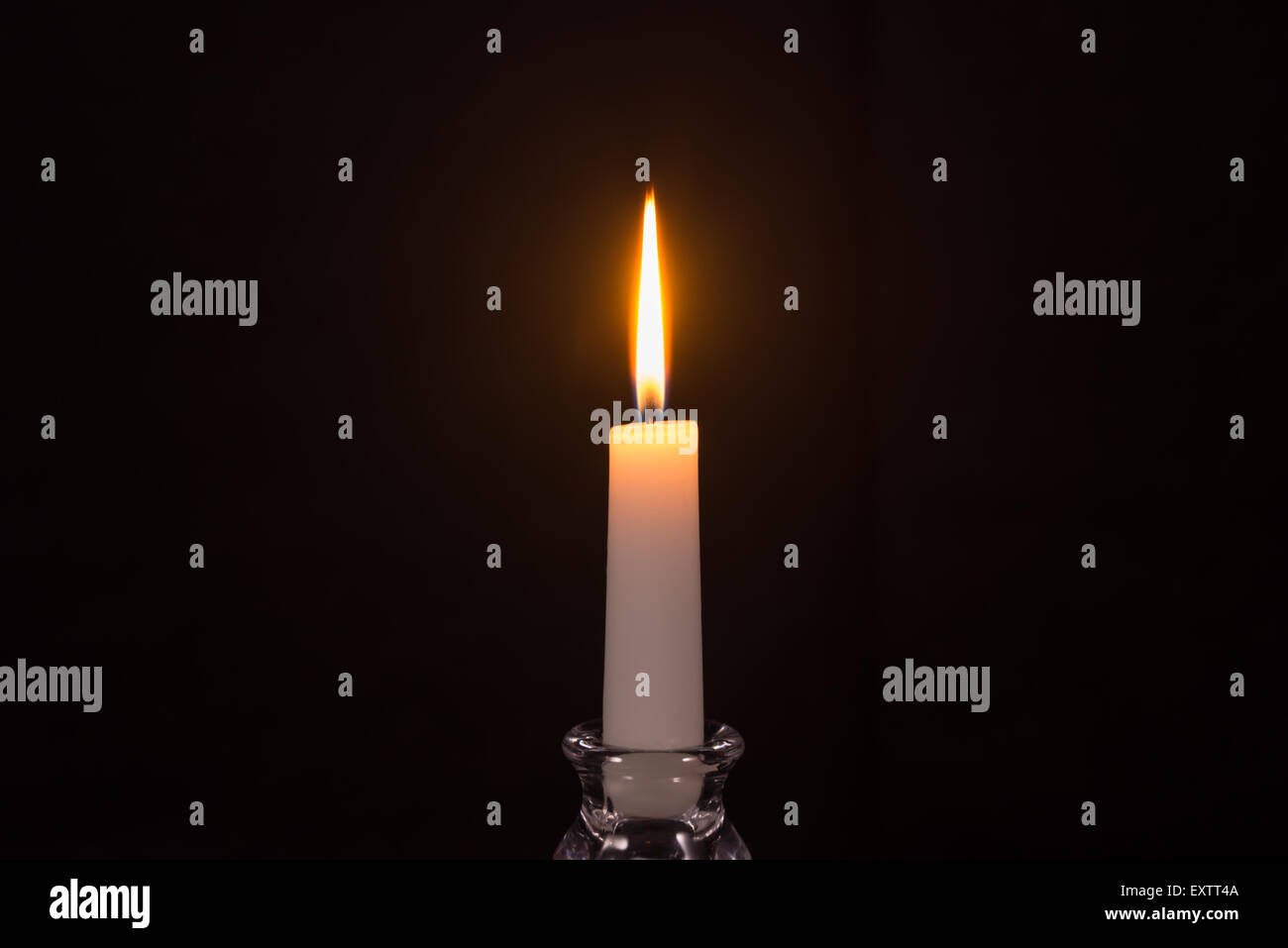Burning candle with melting wax hires stock photography and images Alamy