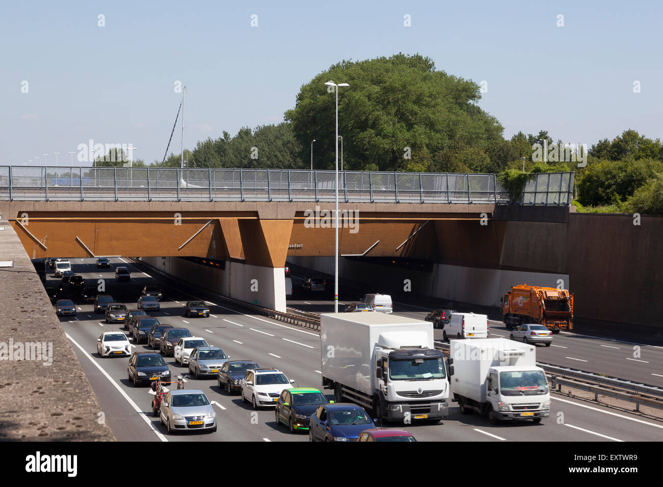 traffic jam under aquaduct near Gouda in the netherlands over highway A12 Stock Photo