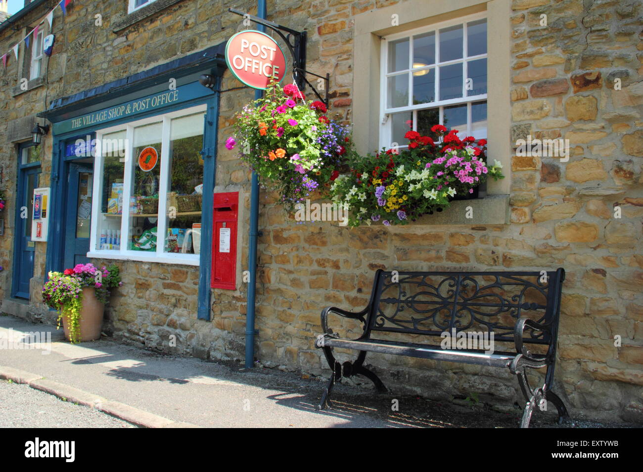 The Village shop and Post Office in Pilsley, a Chatsworth Estate village in the Peak District, Derbyshire England UK Stock Photo