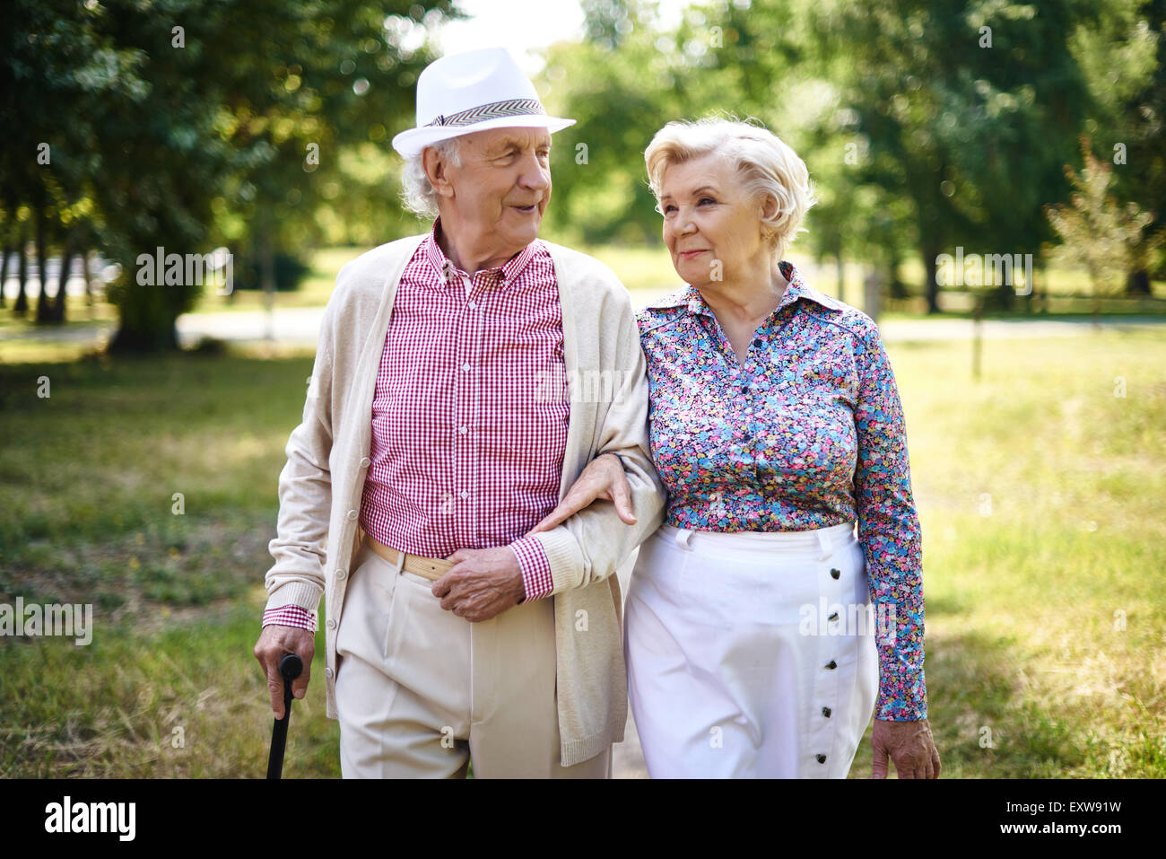 Elderly couple going walk hi-res stock photography and images - Alamy