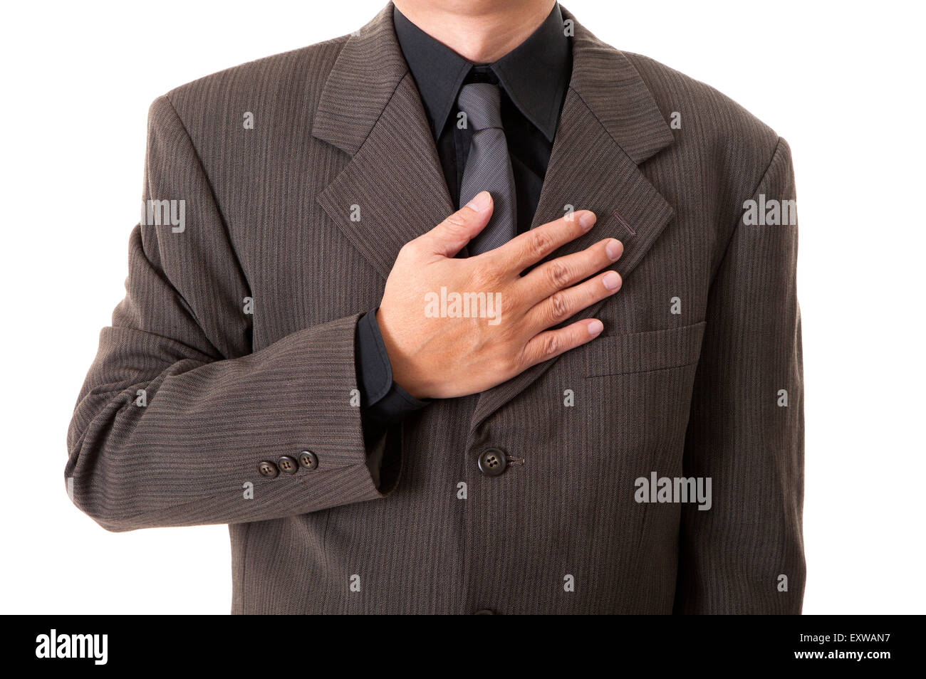 Man making oath with hand on chest, Stock Photo