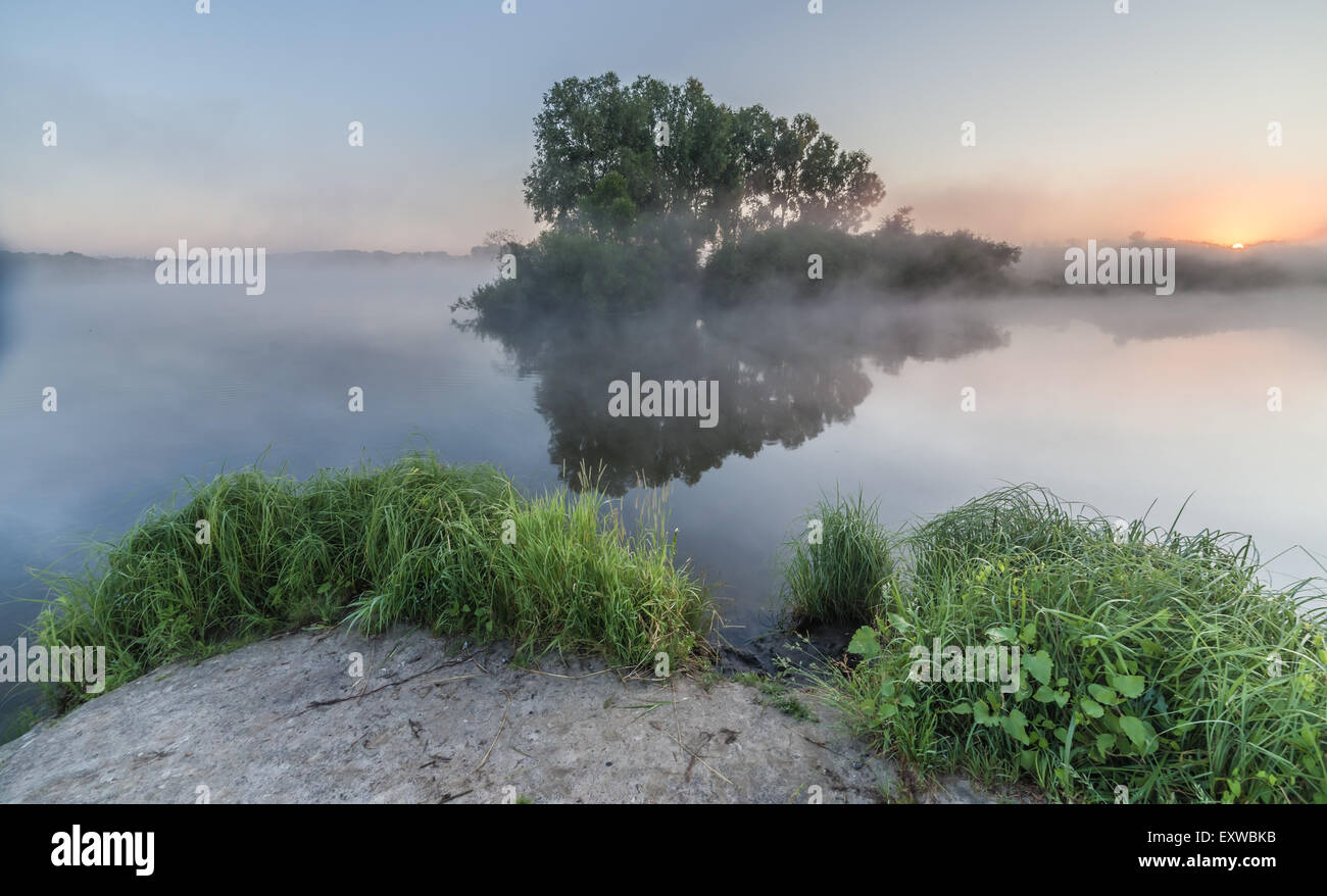 summer sunrise over the river with a fog Stock Photo - Alamy