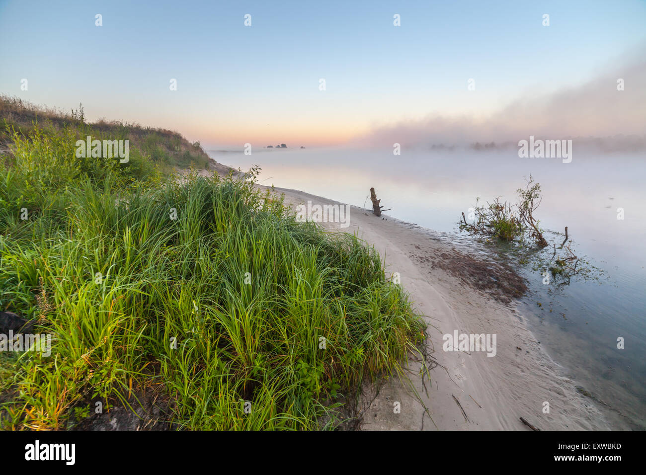 summer sunrise over the river with a fog Stock Photo - Alamy