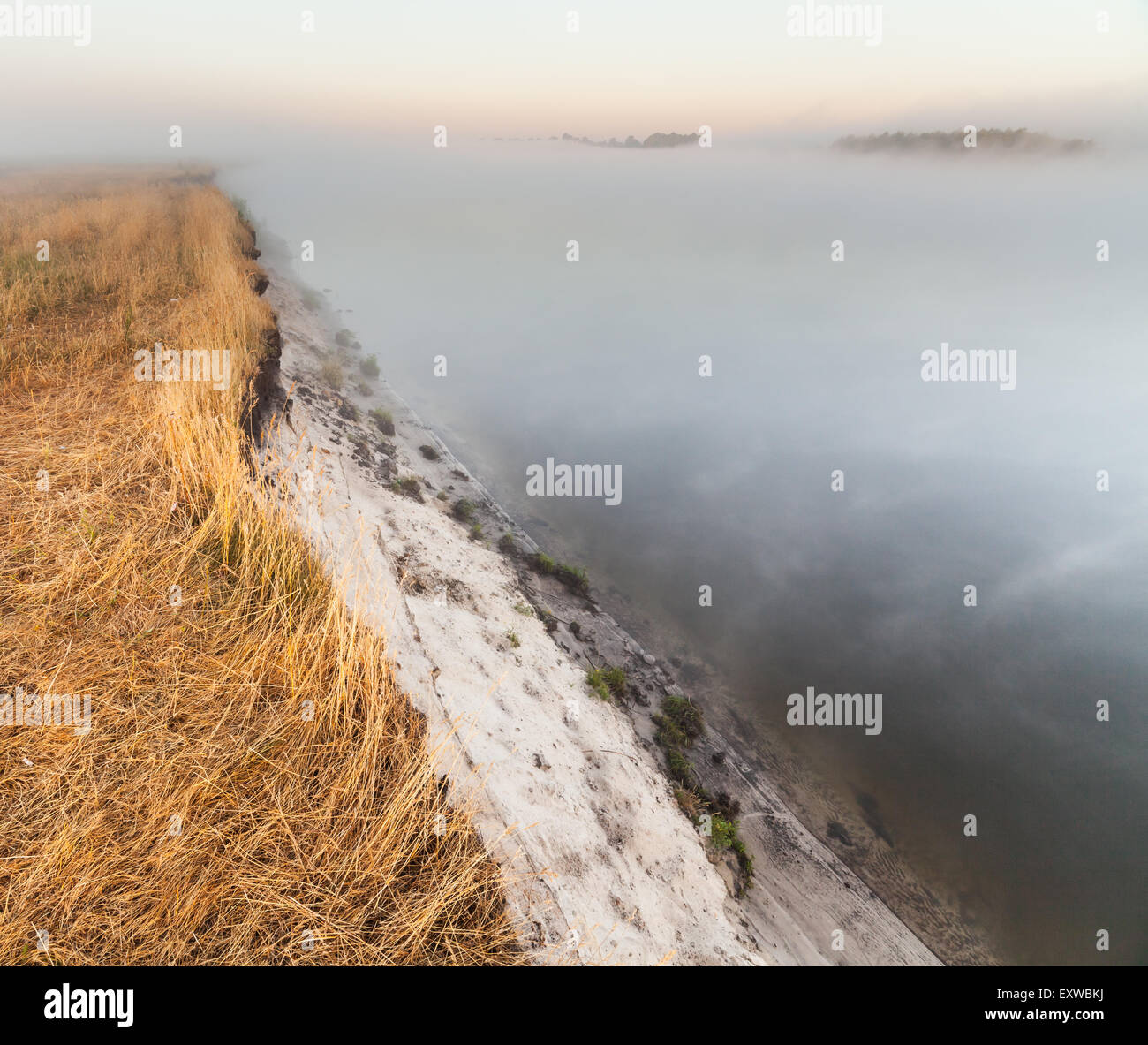 summer sunrise over the river with a fog Stock Photo - Alamy