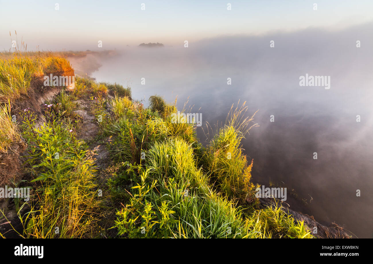 summer sunrise over the river with a fog Stock Photo - Alamy