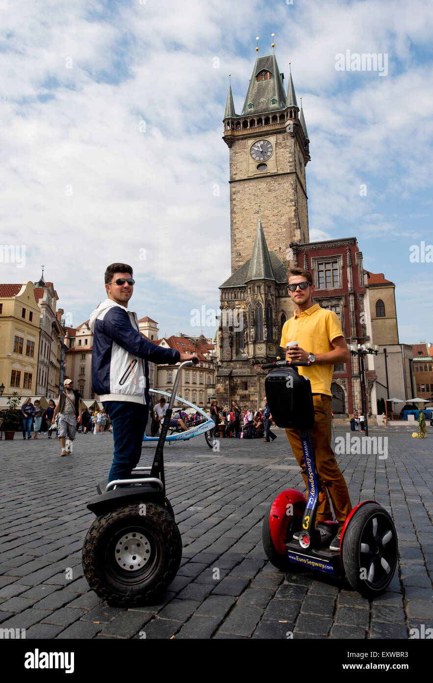 Tourists on two-wheeled electric vehicle segway at Old Town Square, Prague, Czech Republic, on Thursday, July 16, 2015. (CTK Photo/Vit Simanek) Stock Photo