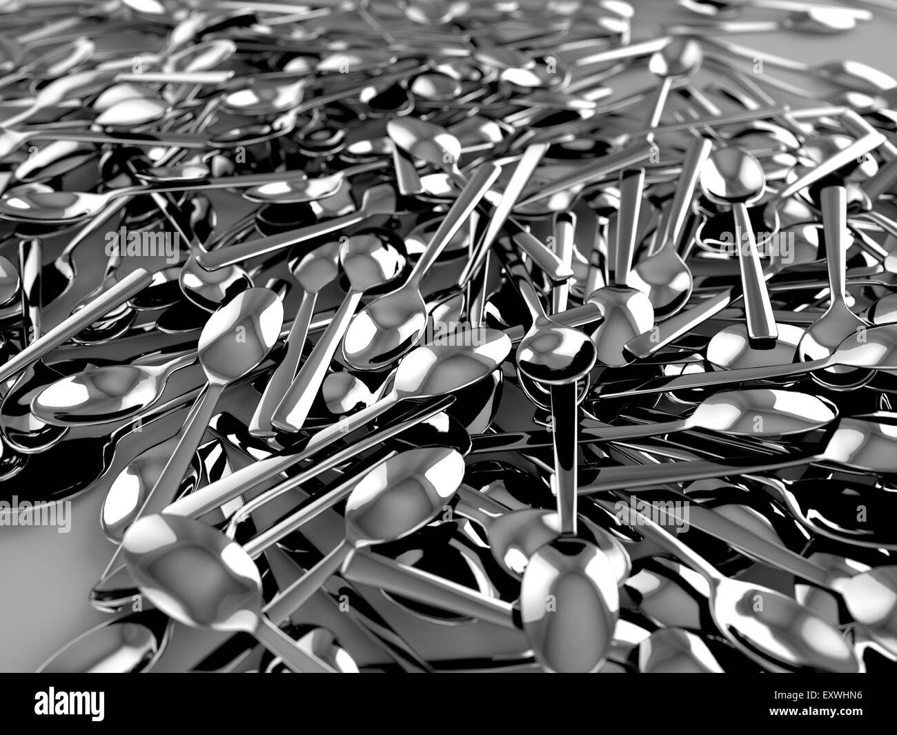 A pile of shiny spoons Stock Photo