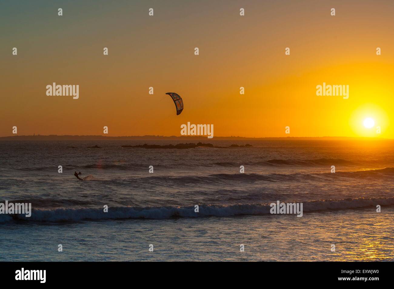 Kitesurfer in Bloubergstrand at sunset, Cape Town, South Africa Stock Photo