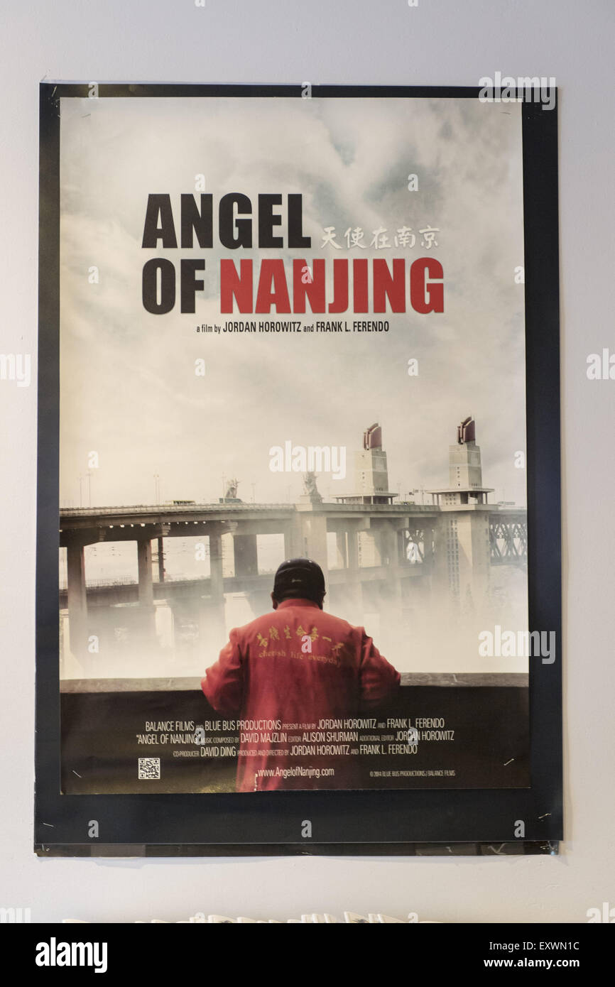Bellmore, New York, USA. 16th July, 2015. A movie poster for ANGEL OF NANJING, a documentary by filmmakers Jordan Horowitz and Frank Ferendo, is on display in the Bellmore Movies lobby during the LIIFE Awards Ceremony. The film won the Best Documentary award at the 18th Long Island International Film Expo, and is about Chen Si who has saved over 300 people from commiting suicide at the Yangtze River Bridge in Nanjing, the most popular place in the world to commit suicide. Credit:  Ann Parry/ZUMA Wire/Alamy Live News Stock Photo