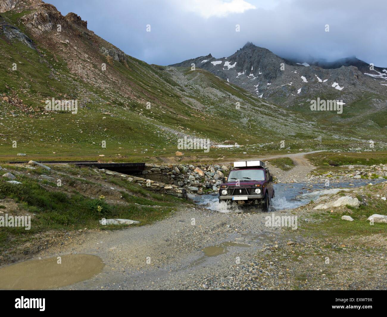Off-road vehicle, Col de Sommeiller, Cottian Alps, West Alps, Piemont, Italy, Europe Stock Photo