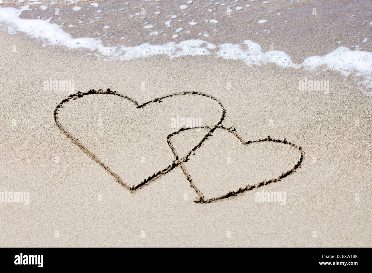 Hearts painted in sand, Italy, Europe Stock Photo