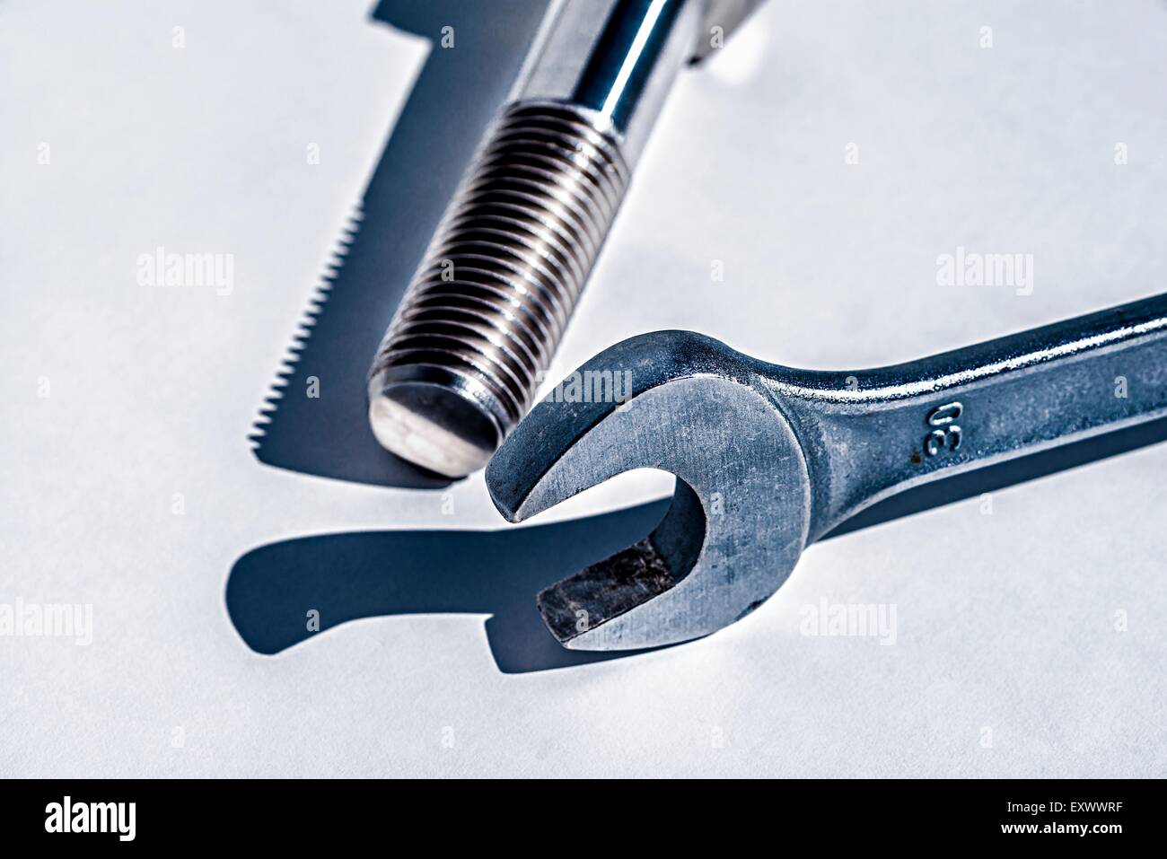 Screw with wrench Stock Photo