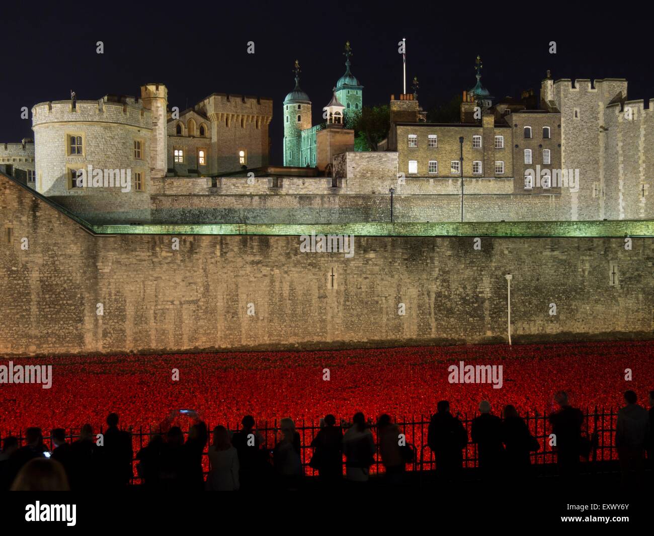 Poppy installation at Tower of London at night, London, UK Stock Photo