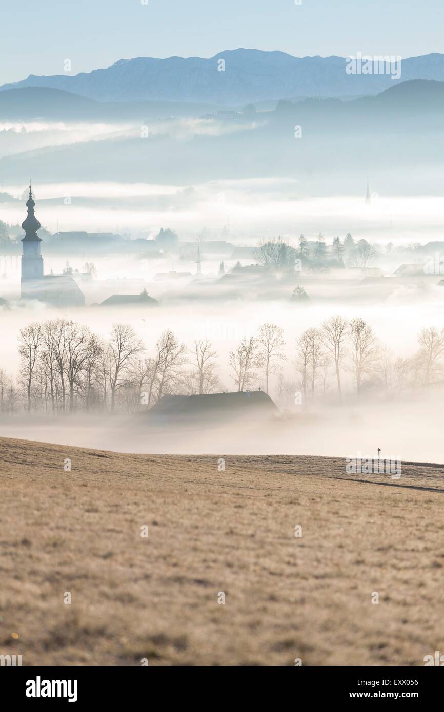 Ground fog over village Köstendorf in Flachgau in winter, Austria Stock Photo