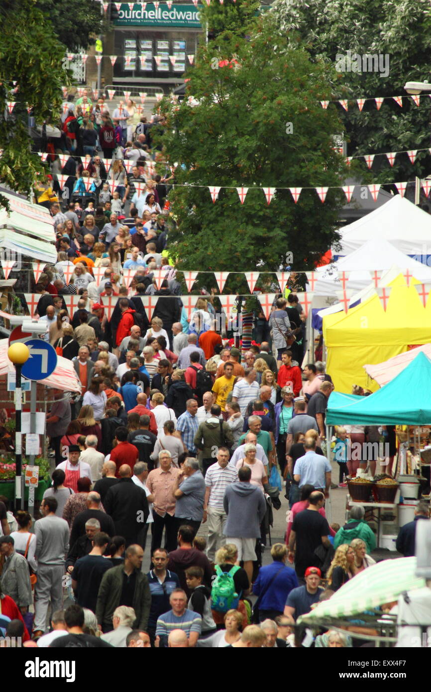 A crowd gathers at Belper Food Festival in Derbyshire, England UK - King Street, summer. Stock Photo