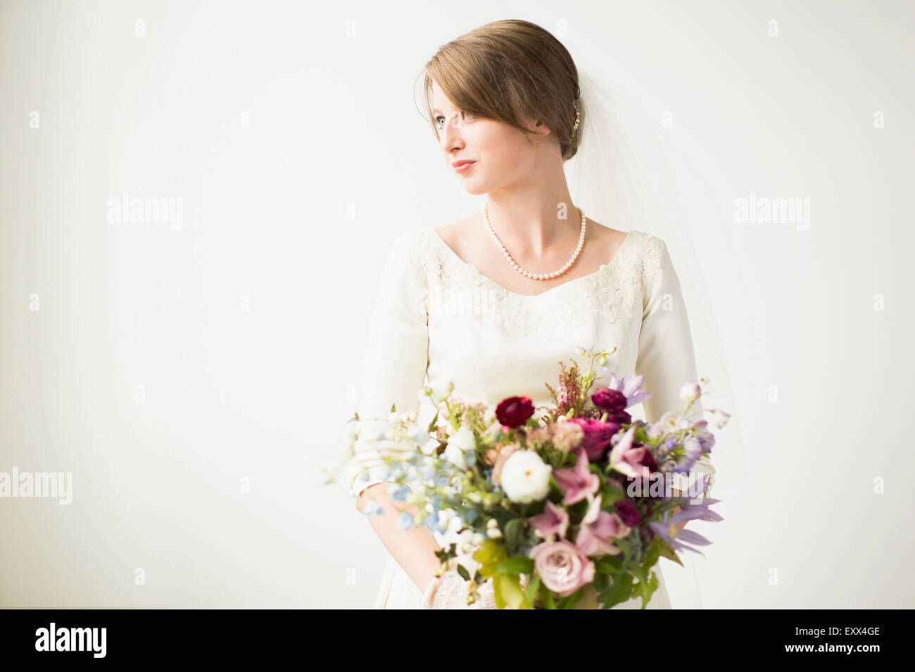 Portrait of bride with wedding bouquet Stock Photo
