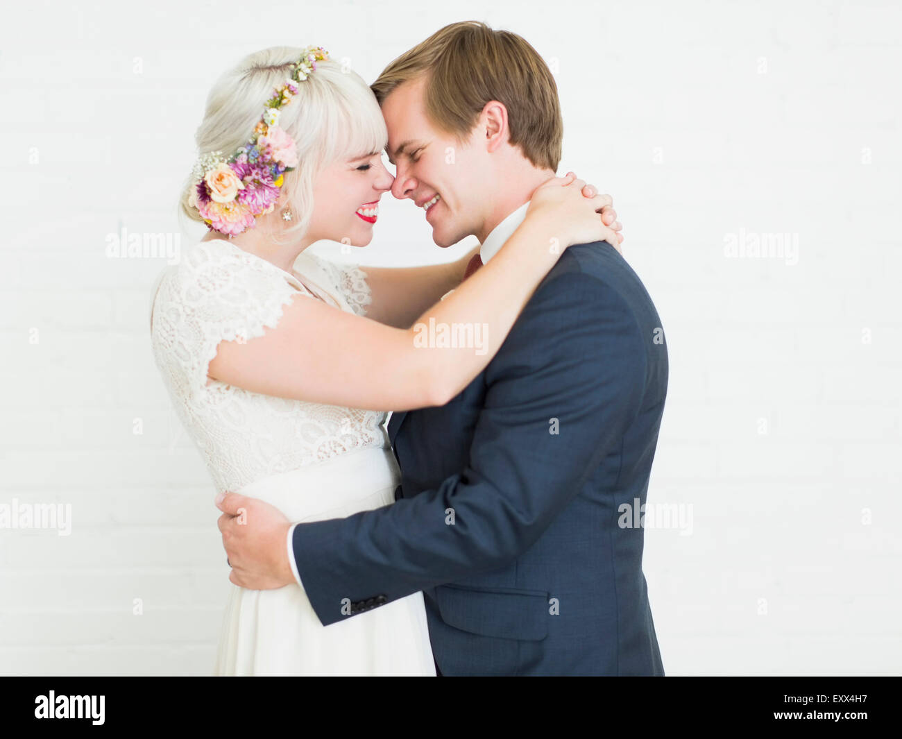 Happy newlywed couple hugging other hi-res stock photography and images ...