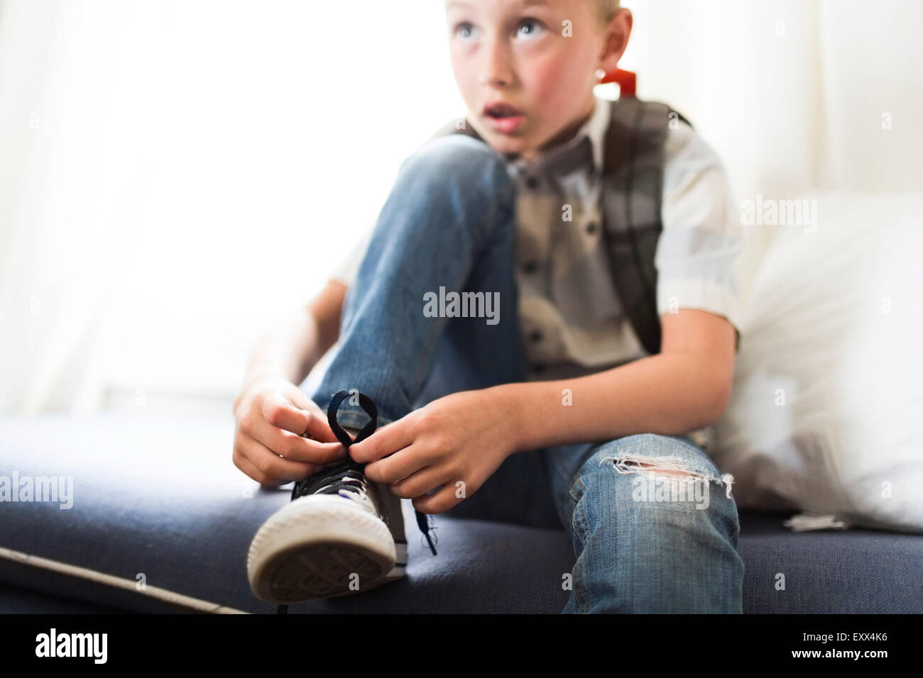 Tying shoes and kid hires stock photography and images Alamy
