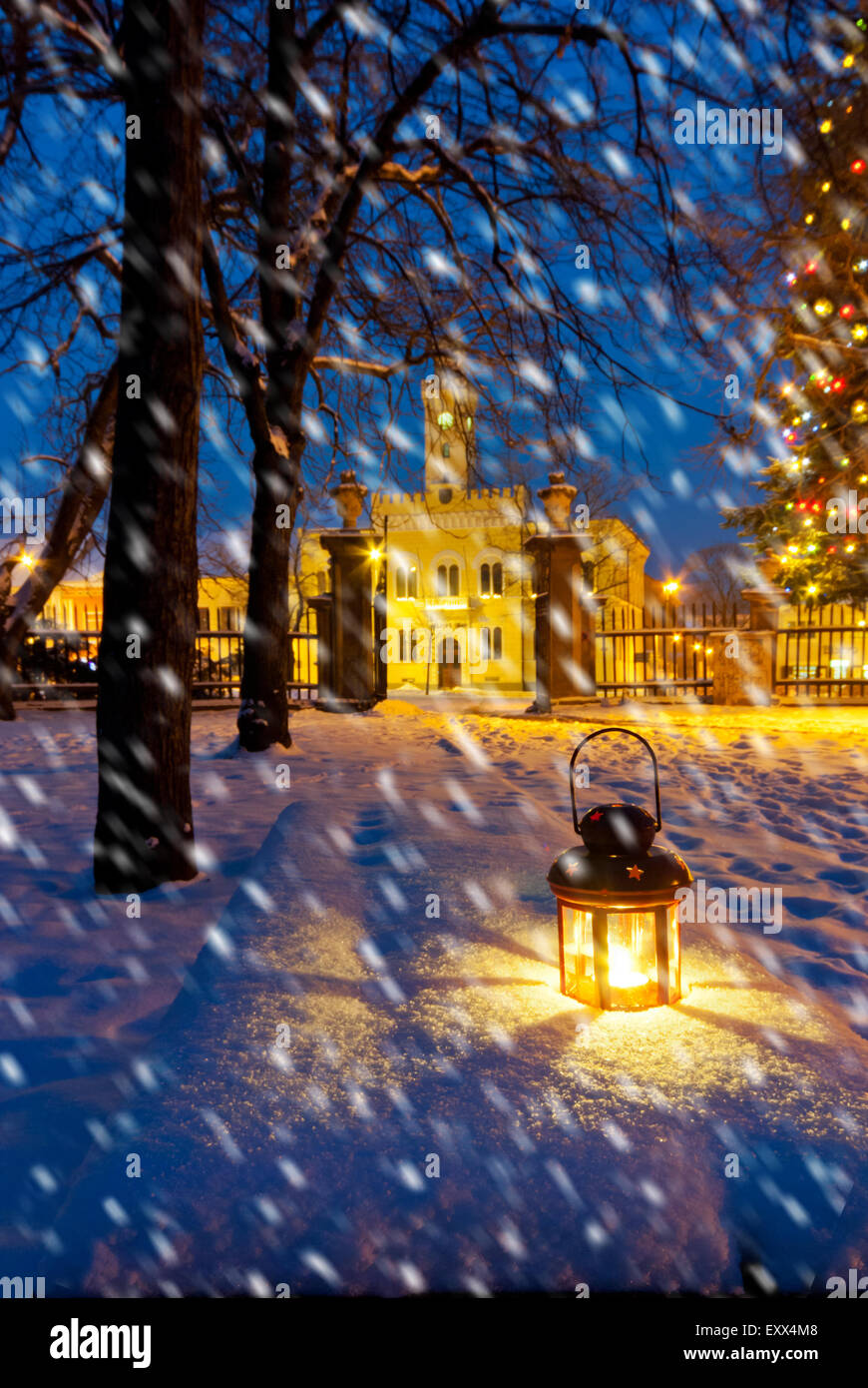 lantern in park at night with snowfall Stock Photo - Alamy