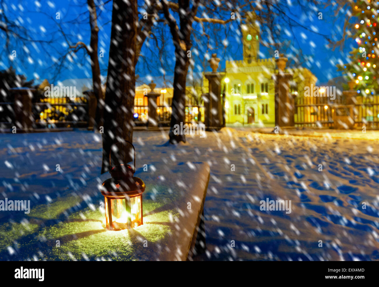 lantern in park at night with snowfall Stock Photo - Alamy