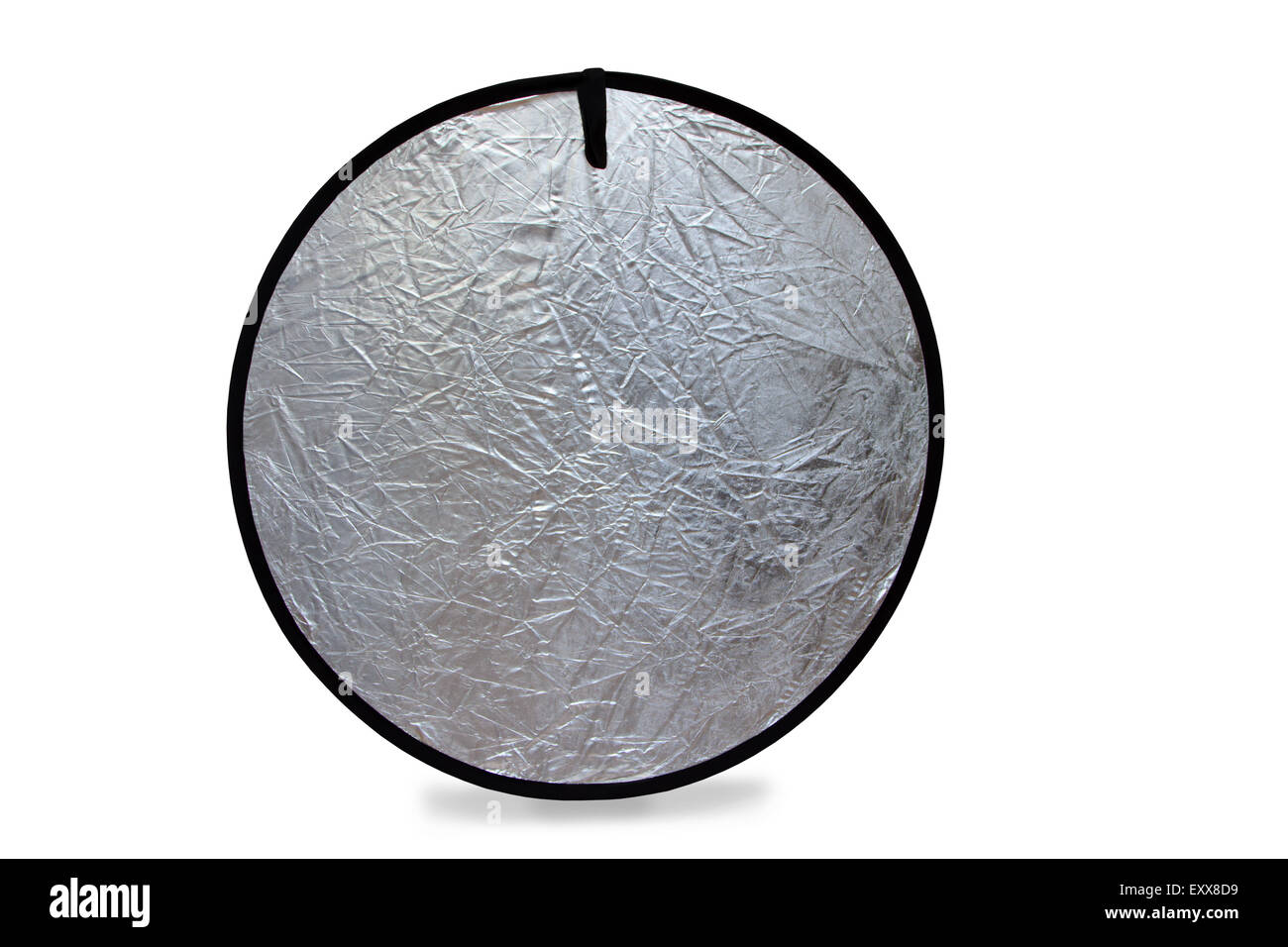 Isolated photo of a photography light reflector in silver Stock Photo