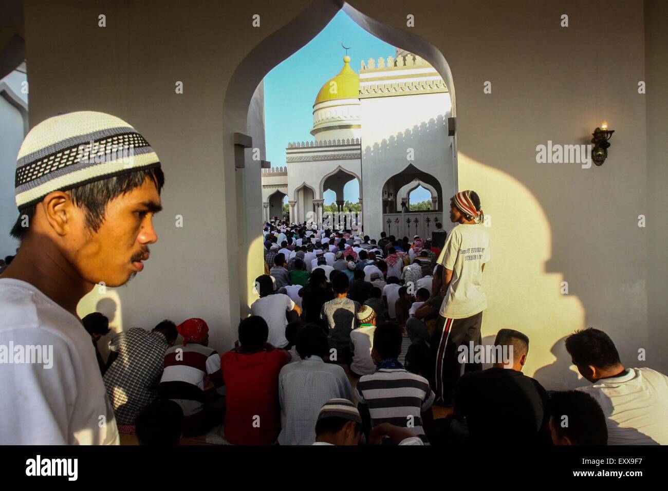 Cotabato, Philippines. 17th July, 2015. Muslims attends the congregational prayer at Grand Mosque in Cotabato city, southern part of Philippines . Muslims all over the world celebrates the end of Ramadan. Credit:  Dante Dennis Diosina Jr./Pacific Press/Alamy Live News Stock Photo