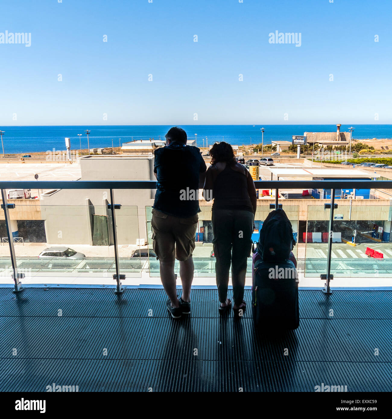 PALERMO, ITALY - AUGUST 27, 2014: passengers wait for their flights on terrace in Falcone Borsellino Airport in Palermo, Italy. Stock Photo