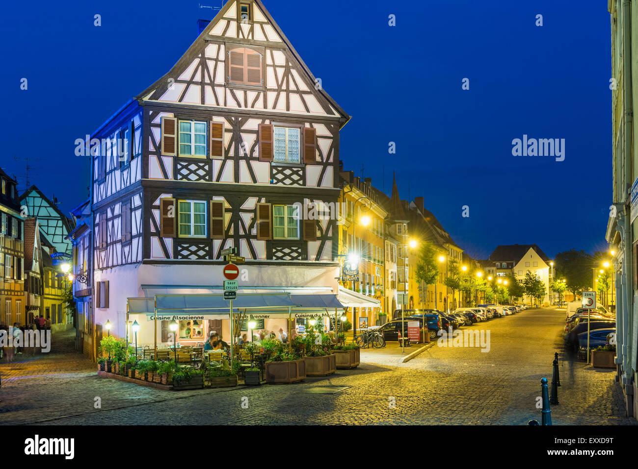 Old Town district in Colmar, Alsace, France, Europe - medieval street in the old town with restaurant Stock Photo