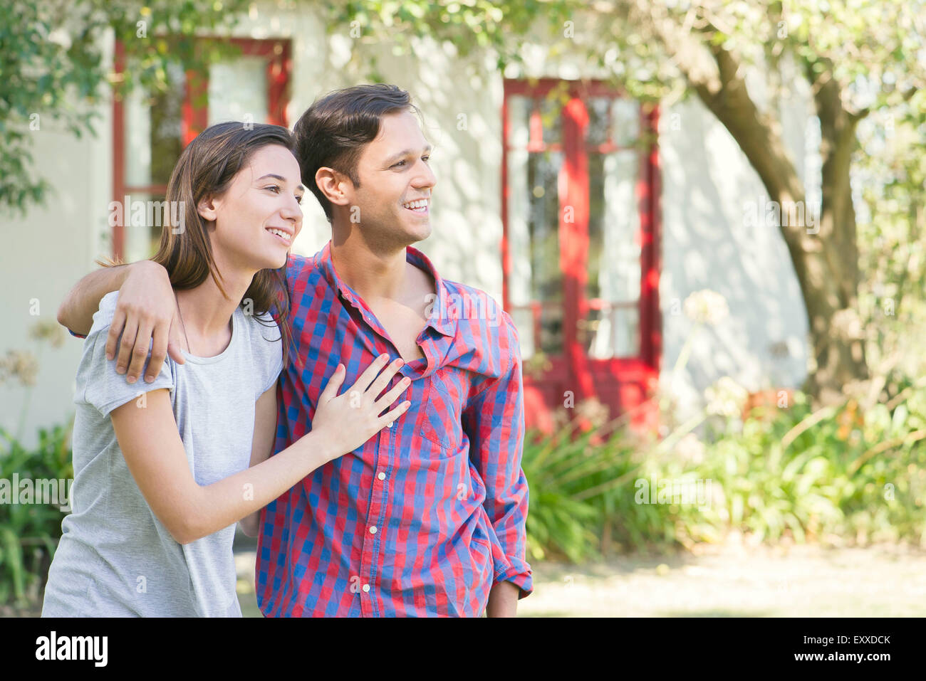 Couple smiling together outdoors Stock Photo