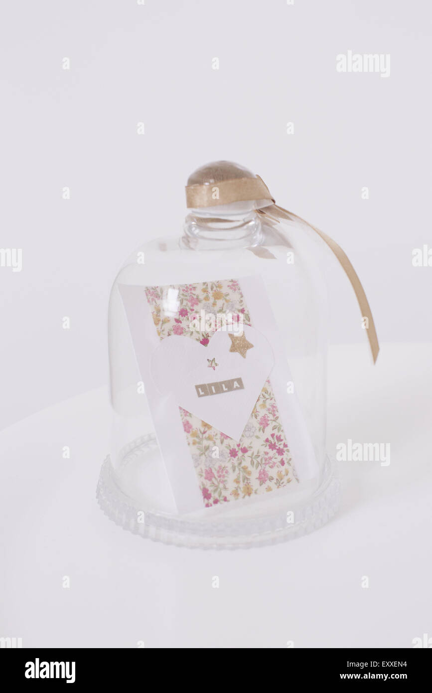 Decorative card in glass jar Stock Photo
