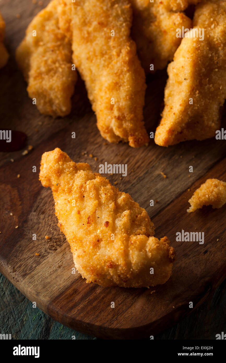 Homemade Breaded Chicken Tenders with Fries and BBQ Sauce Stock Photo Alamy