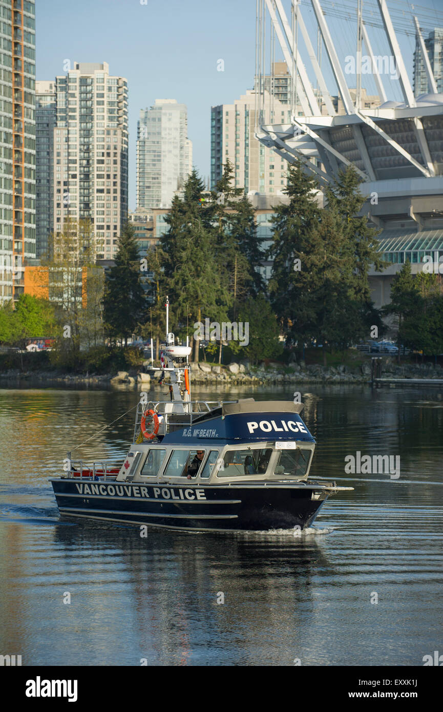 Vancouver Police Force Marine Unit boat R G Mcbeath patrolling False Creek Harbour Stock Photo